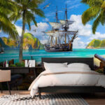 Carta da parati Nave pirata ancorata in un paradiso tropicale.