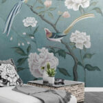Carta da parati Pittura di uccelli su un ramo con fiori