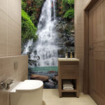 Carta da parati Maestosa cascata in mezzo al verde.