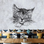 Carta da parati Disegno di gattino addormentato su carta.