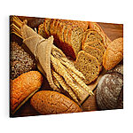 Stampa su tela Assortimento di pane con steli di grano