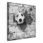 Stampa su tela Pallone da calcio contro un muro di mattoni