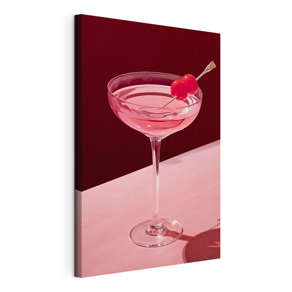 Bicchiere con un liquido rosa e due ciliegie sopra Stampa su tela Bicchiere con un liquido rosa e due ciliegie sopra