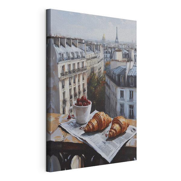 Una tazza di caffè e dei croissant su un tavolo, con degli edifici sullo sfondo Stampa su tela Una tazza di caffè e dei croissant su un tavolo, con degli edifici sullo sfondo
