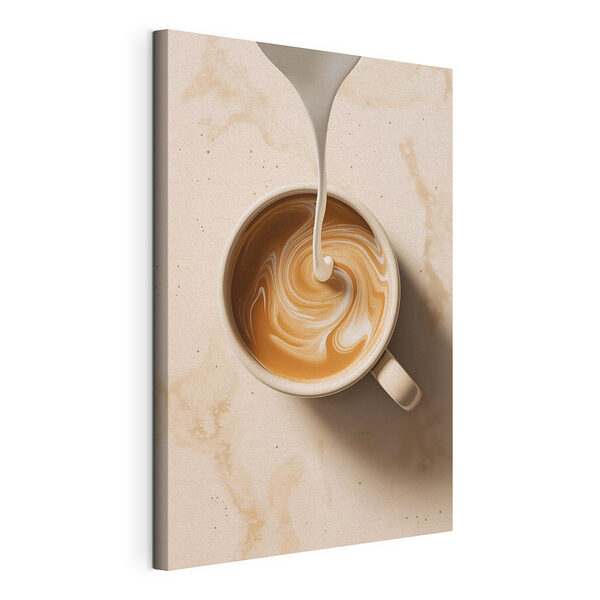 Stampa su tela Una tazza di caffè in cui si versa del latte