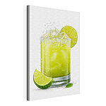 Stampa su tela Un bicchiere di succo di lime con ghiaccio e fette di lime